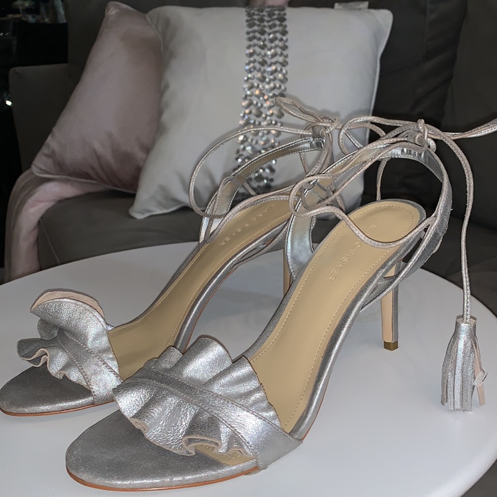Marc Fisher Silver leather ankle wrap heels.